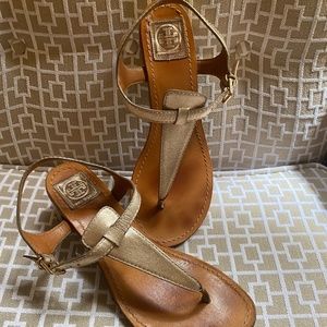 Tory Burch Gold thong sandals with brass block hee